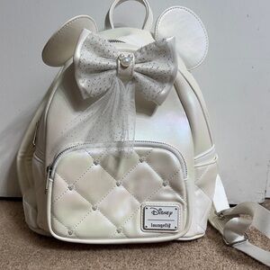 Loungefly Cream Iridescent Quilted Backpack with 2 Bows. Used only 1 time